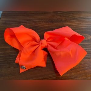 Jojo Siwa signature collection large cheer hair bow. (Neon coral)